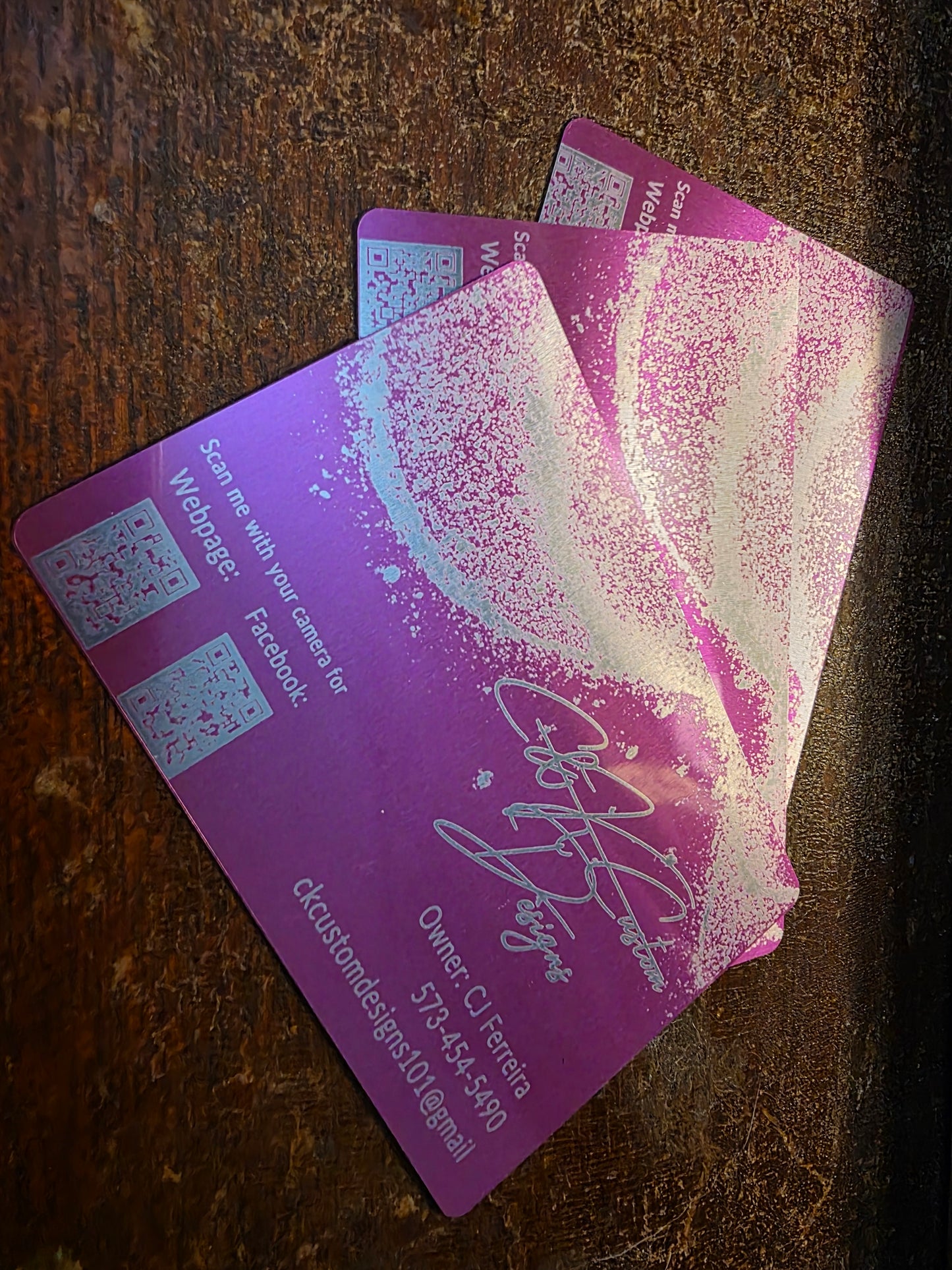 Pink and silver business cards